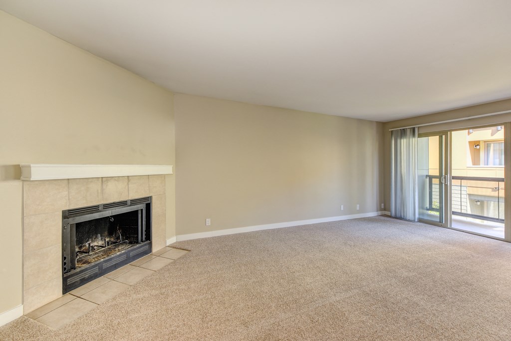 Vacant Kelsey and Mercer Spacious Living Room with fireplace in select homes. 